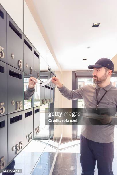 postal worker - pigeon mail stock pictures, royalty-free photos & images