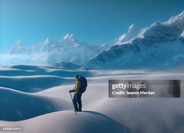 hiker on mountain snow peak - daily life in nepal photos et images de collection