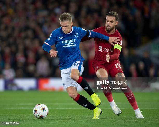 Steven Davis of Rangers FC and Jordan Henderson of Liverpool during the UEFA Champions League group A match between Liverpool FC and Rangers FC at...