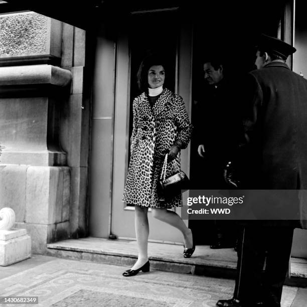 Jacqueline Kennedy and Gian Carlo Menotti exit Quo Vadis at 26 East 63rd Street in New York.