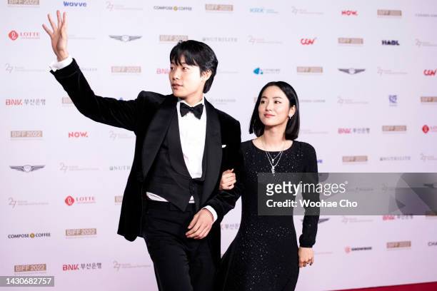 The hosts, Ryu Jun-yeol and Jeon Yeo-been walk on the red carpet at the opening ceremony during the 27th Busan International Film Festival at Busan...