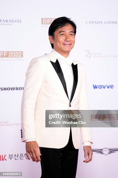 Tony Leung Chiu Wai walks on the red carpet at the opening ceremony during the 27th Busan International Film Festival at Busan Cinema Center on...