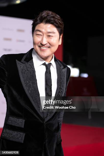 Song Kang-Ho walks on the red carpet at the opening ceremony during the 27th Busan International Film Festival at Busan Cinema Center on October 05,...