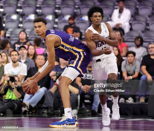 Scoot Henderson of G League Ignite runs back on defense after Victor Wembanyama of Boulogne-Levallois Metropolitans 92 grabbed a rebound in the third...