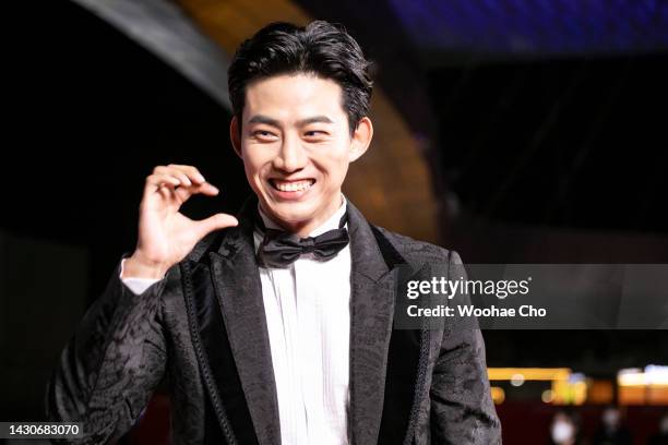 Ok Taec-yeon walks on the red carpet at the opening ceremony during the 27th Busan International Film Festival at Busan Cinema Center on October 05,...