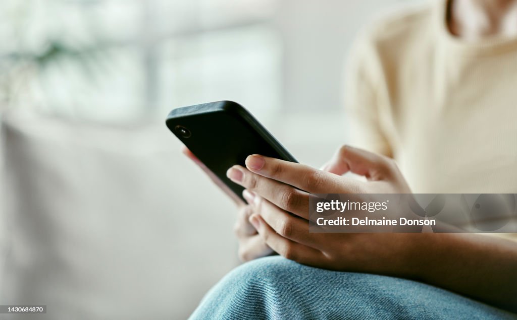 Person hands with smartphone for mobile app, social media or online networking on home wifi or internet. Woman with cellphone technology reading digital news or check website for information contact
