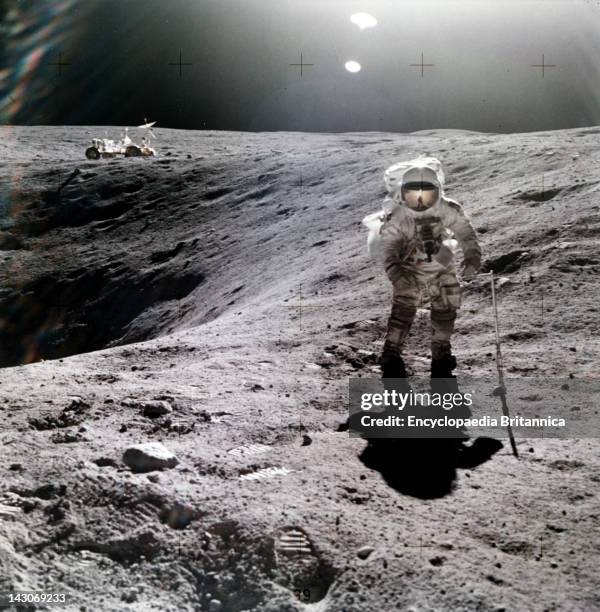 Astronaut Charles M, Duke, Jr, On Moon, Charles M, Duke, Jr, Lunar Module Pilot Of The Apollo 16 Mission, Collecting Lunar Samples At The Rim Of The...