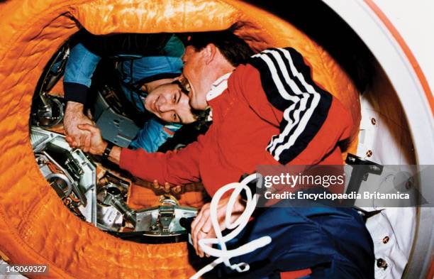 Robert Gibson Shaking Hands With Vladimir Dezhurov, Robert Gibson Shaking Hands With Vladimir Dezhurov After The U.S, Space Shuttle Atlantis Docked...