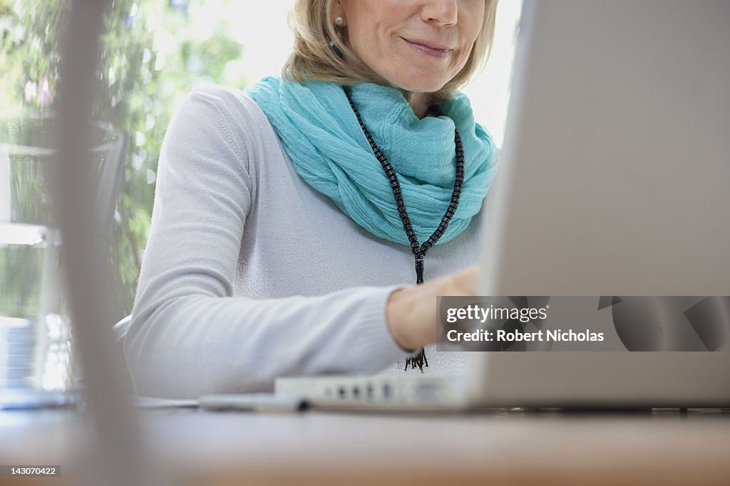 Older woman using laptop