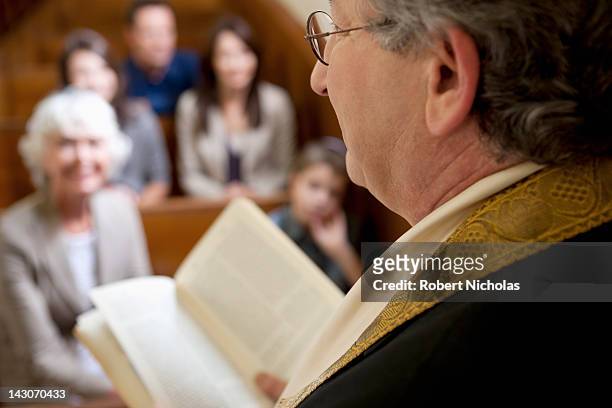 close up of rabbi reading from torah - pastor stock pictures, royalty-free photos & images