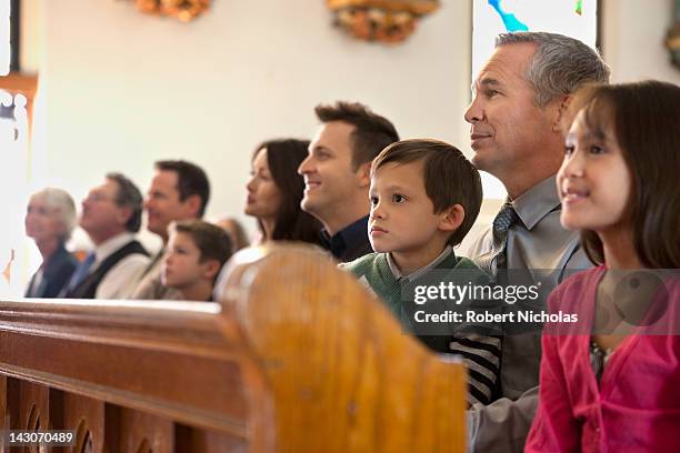 congregation sitting in church - congregation stockfoto's en -beelden