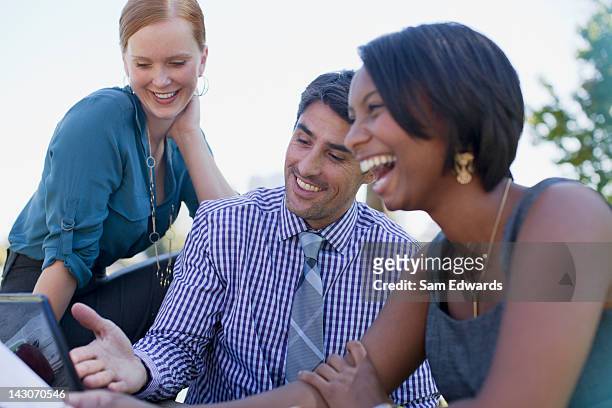 business people working in park - business lunch outside stock pictures, royalty-free photos & images
