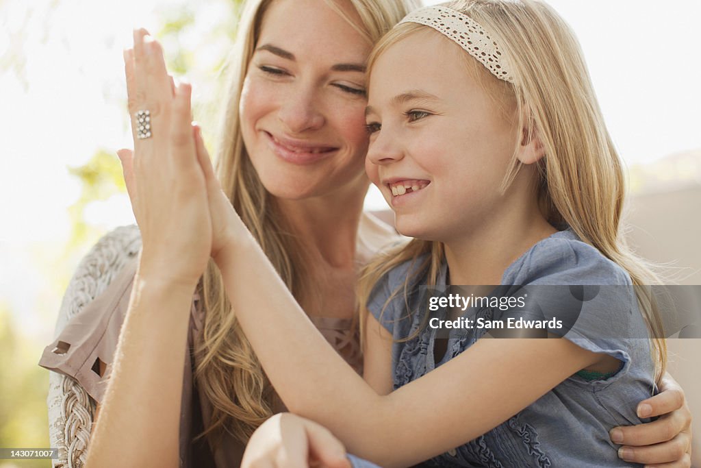 Mother and daughter relaxing together