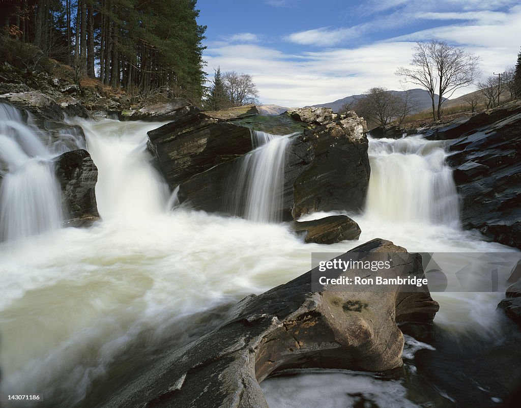 Time lapse view of rocky waterfall