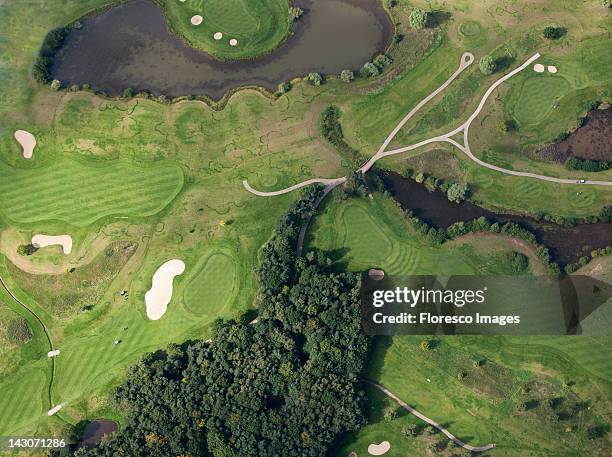 aerial view of golf course - golf eng stock pictures, royalty-free photos & images