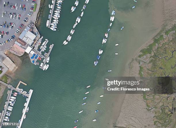 aerial view of boats docked in harbor - boat launch stockfoto's en -beelden