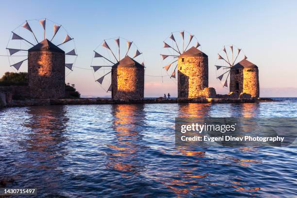 windmills of chios - dodecanese islands stock-fotos und bilder