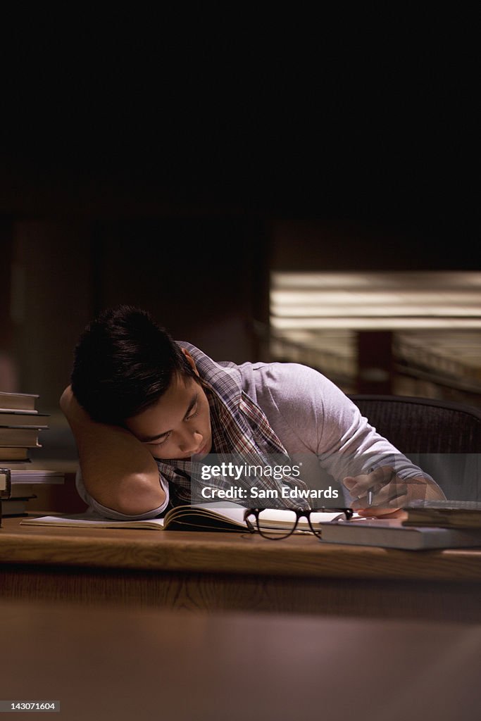 Student working in library at night