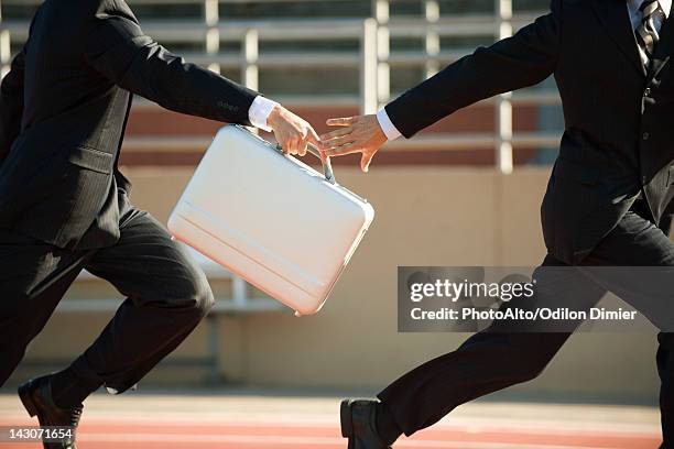 Briefcase Hand Off 124 Handing Off Bag Stock Photos, High-Res Pictures, and Images - Getty ...