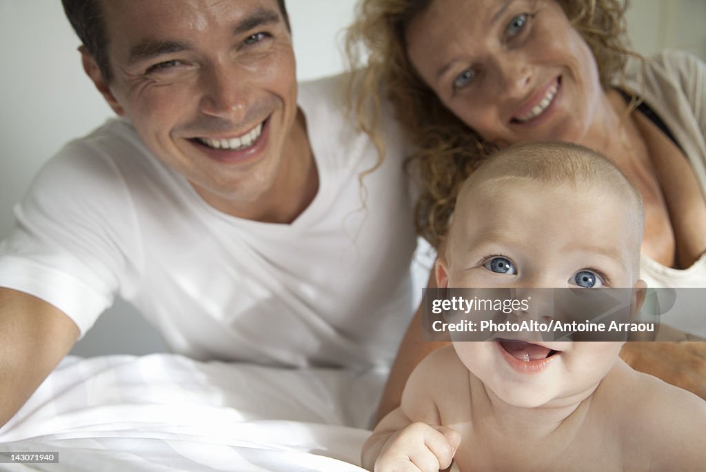 Parents with baby, portrait