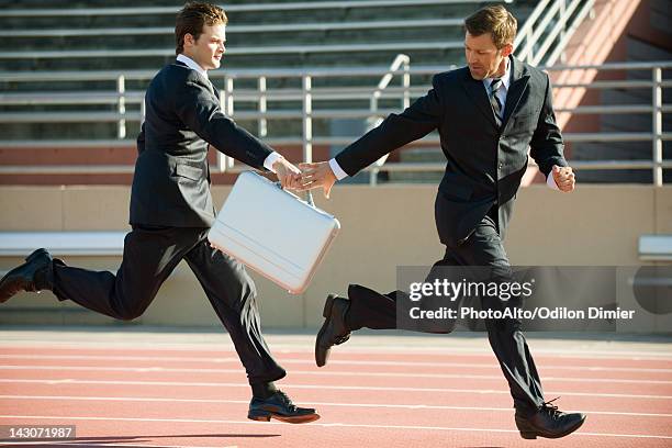 Briefcase Hand Off 106 Handing Off Bag Stock Photos, High-Res Pictures, and Images - Getty ...