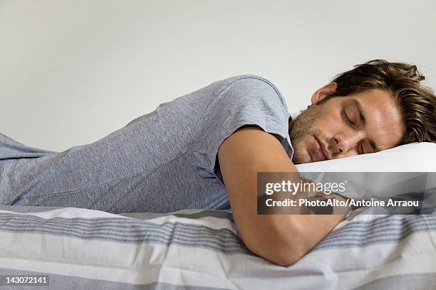 man sleeping - sleeping man stock pictures, royalty-free photos & images