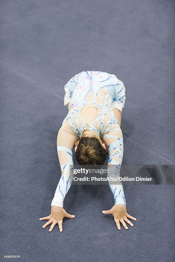 Female gymnast performing floor routine