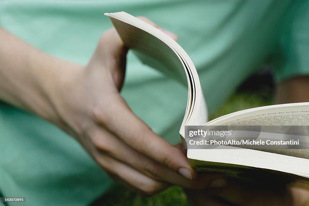 Man reading book, close-up