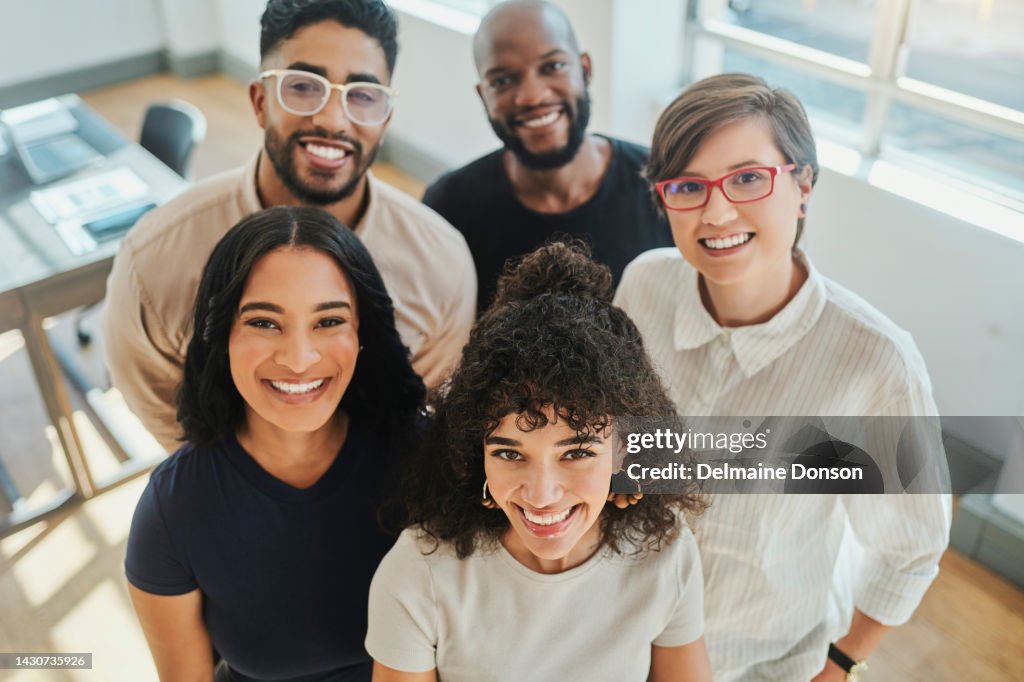 Men, women and global teamwork diversity for about us, contact us or meet the team website for creative startup. Top view portrait, smile and happy marketing collaboration people with success mindset