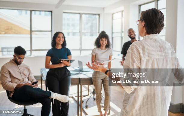 presentation, communication and business leader with team in discussion, conversation or talking about marketing strategy. meeting, collaboration and employee writing notes for company success goal - online presenter stock pictures, royalty-free photos & images
