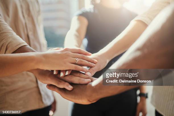hands of staff, together in diversity and community support. teamwork, collaboration and trust of a business employee at the workplace. team building is a strategy, to grow solidarity and staff unity - employee engagement banner stock pictures, royalty-free photos & images