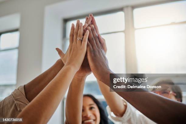 teamwork, motivation and business people high five collaboration in support of global mission success in office. goal, vision and team building by fun colleagues hands connected in planning strategy - teambuilding stockfoto's en -beelden