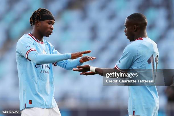 Joel Ndala and Carlos Borges of Manchester City interact after the UEFA Youth League match between Manchester City and FC Copenhagen at Manchester...