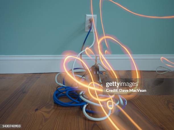 electricity in motion over cables - turning on light switch stock pictures, royalty-free photos & images