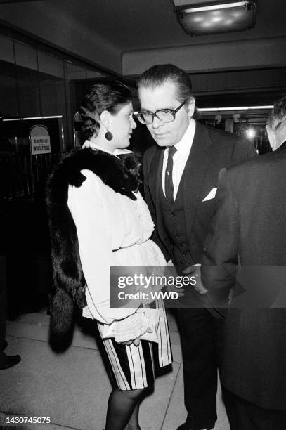 Diane de Beauvau-Craon and Karl Lagerfeld attend a party at Maxim's, a nightclub in Paris, France, on March 9, 1981.