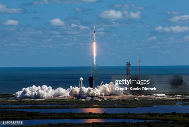SpaceX’s Falcon 9 rocket with the Dragon spacecraft atop takes off from Launch Complex 39A at NASA's Kennedy Space Center on October 05, 2022 in Cape...