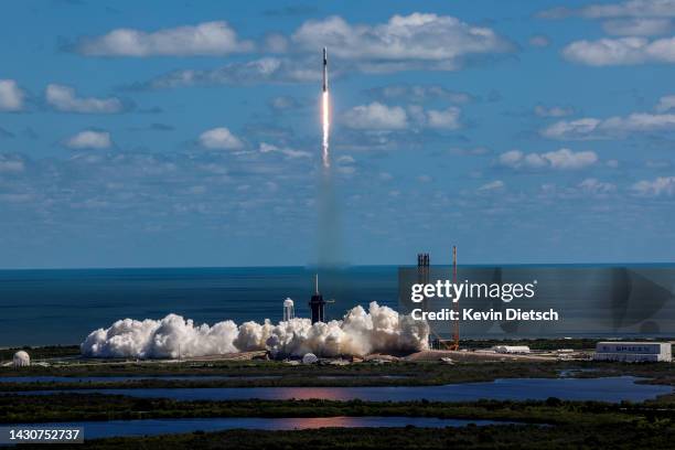 SpaceX’s Falcon 9 rocket with the Dragon spacecraft atop takes off from Launch Complex 39A at NASA's Kennedy Space Center on October 05, 2022 in Cape...