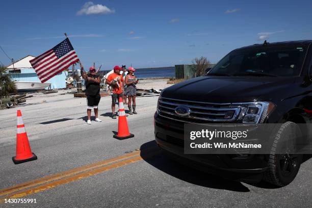 Pine Island residents wait for Florida Gov. Ron DeSantis to arrive at a press conference on the island of Matlacha on October 05, 2022 in Matlacha...