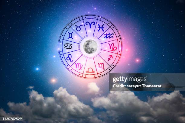 zodiac signs inside of horoscope circle. astrology in the sky with many stars and moons  astrology and horoscopes concept - star signs fotografías e imágenes de stock