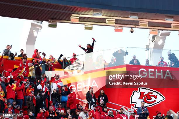 Kansas City rapper Tech N9ne waves to the crowd during the AFC Championship Game between the Cincinnati Bengals and the Kansas City Chiefs at GEHA...