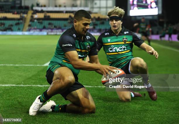 Joel Matavesi of Northampton Saints scores their first try during the Premiership Rugby Cup match between Northampton Saints and Saracens at...