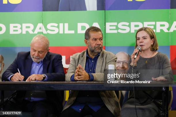 Gleisi Hoffmann President of Party speaks next to Carlos Lupi President of Party and Candidate Luiz Inacio Lula da Silva of Workers' Party during a...