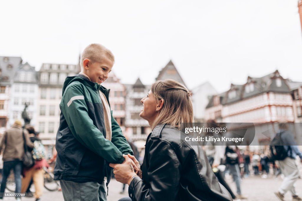 Close-up of mother with son.