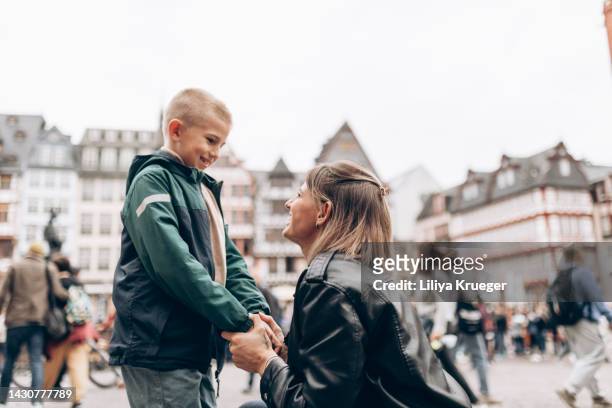 close-up of mother with son. - hesse stock pictures, royalty-free photos & images