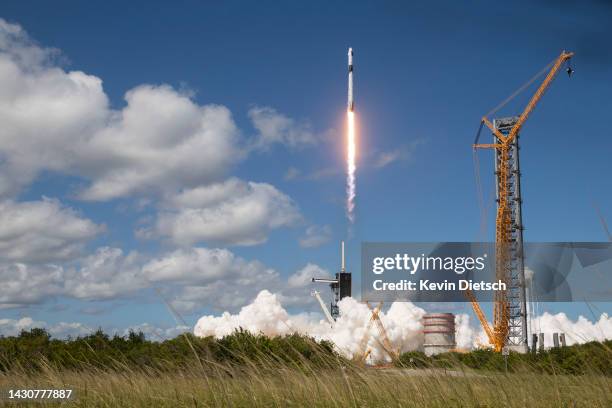 SpaceX’s Falcon 9 rocket with the Dragon spacecraft atop takes off from Launch Complex 39A at NASA's Kennedy Space Center on October 05, 2022 in Cape...