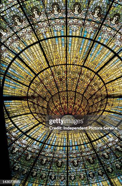 The stained glass ceiling in the Palace of Catalan Music, Palau de la Musica Catalana, Barcelona, Spain. The concert hall was designed 1908 by Lluis...