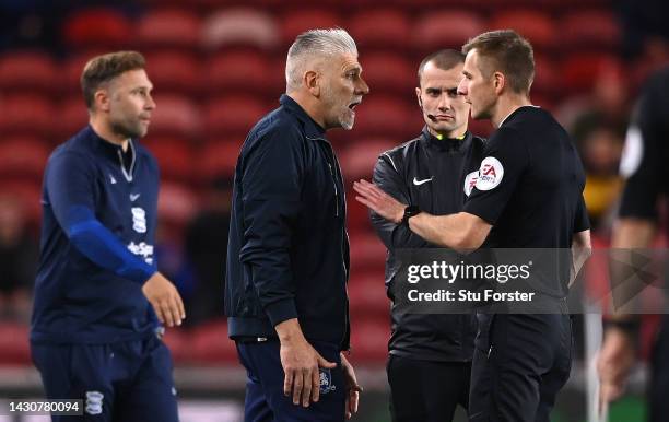 Middlesbrough interim manager Leo Percovich is spoken to by referee Michael Salisbury during the Sky Bet Championship between Middlesbrough and...