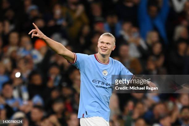Erling Haaland of Manchester City celebrates after scoring their team's first goal during the UEFA Champions League group G match between Manchester...