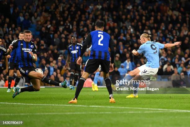 Erling Haaland of Manchester City scores their team's first goal during the UEFA Champions League group G match between Manchester City and FC...