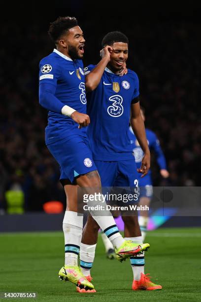Wesley Fofana of Chelsea celebrates with team mate Reece James after scoring their sides first goal during the UEFA Champions League group E match...